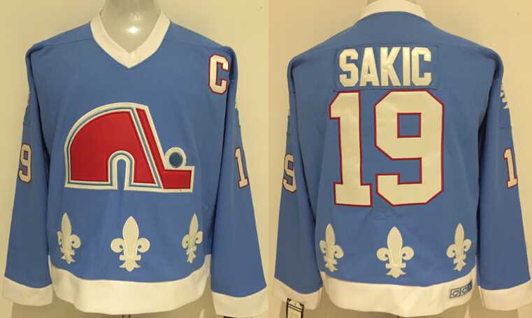 Quebec Nordiques #19 Sakic Light Blue CCM Throwback Stitched NHL Jersey,We sell and wholesale Quebec Nordiques #19 Sakic Light Blue CCM Throwback Stitched NHL Jersey on line form chian!